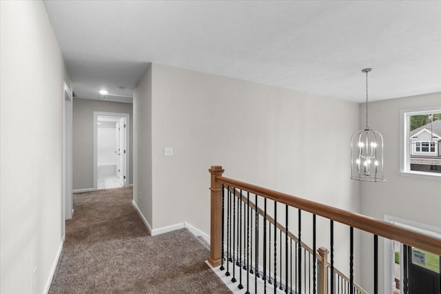 250 Prominence Dr, Grovetown, GA 30813 - corridor with an upstairs landing, a chandelier, carpet flooring, and recessed lighting