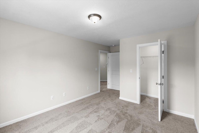 250 Prominence Dr, Grovetown, GA 30813 - unfurnished bedroom with carpet floors, a closet, and a spacious closet