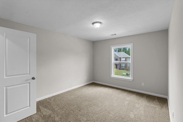 250 Prominence Dr, Grovetown, GA 30813 - carpeted spare room featuring baseboards and a textured ceiling