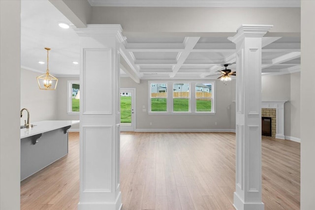 250 Prominence Dr, Grovetown, GA 30813 - unfurnished living room with ceiling fan, coffered ceiling, ornamental molding, recessed lighting, and light wood-type flooring