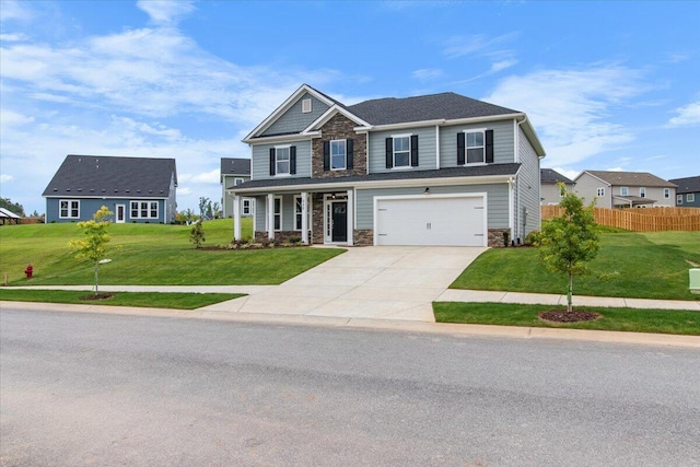 250 Prominence Dr, Grovetown, GA 30813 - craftsman inspired home with stone siding, concrete driveway, an attached garage, and a porch