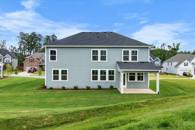 250 Prominence Dr, Grovetown, GA 30813 - back of house featuring a patio, a lawn, roof with shingles, and a residential view
