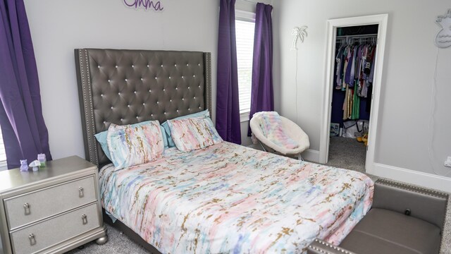 902 Adderley Ln, Evans, GA 30809 - carpeted bedroom featuring a spacious closet, a closet, and baseboards