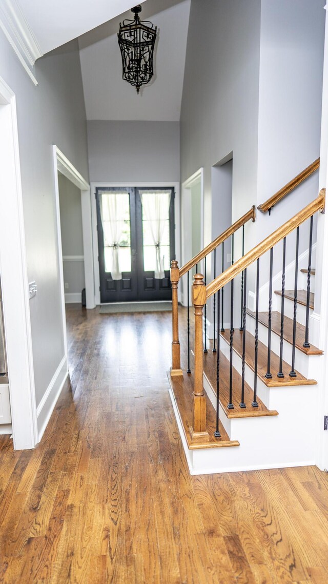 902 Adderley Ln, Evans, GA 30809 - foyer with wood finished floors, stairway, baseboards, and a high ceiling