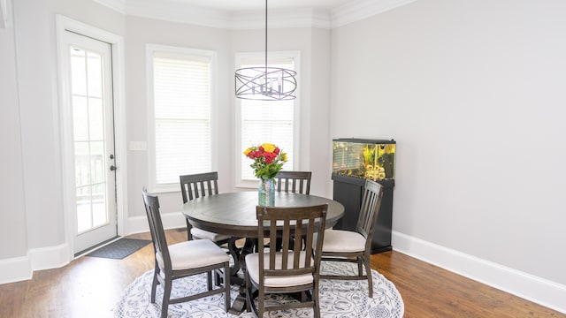 902 Adderley Ln, Evans, GA 30809 - dining area featuring wood finished floors, crown molding, and baseboards