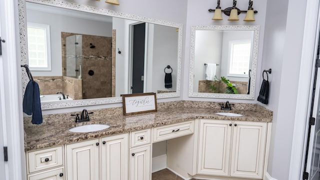 902 Adderley Ln, Evans, GA 30809 - bathroom with a stall shower, plenty of natural light, double vanity, and a garden tub