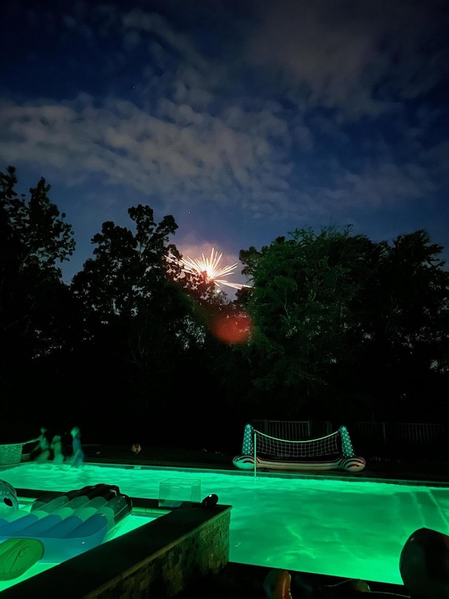 view of pool with fence
