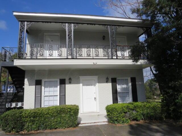 exterior space with a balcony