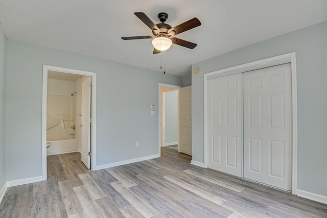 2273 Pund Ave, Augusta, GA 30904 - unfurnished bedroom featuring light wood finished floors, a closet, ensuite bath, and ceiling fan