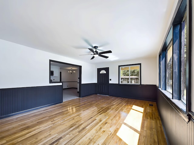 1952 Satcher Blvd, Augusta, GA 30906 - empty room with a wainscoted wall, hardwood / wood-style flooring, and a ceiling fan
