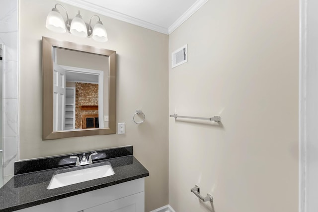 bathroom featuring vanity and ornamental molding