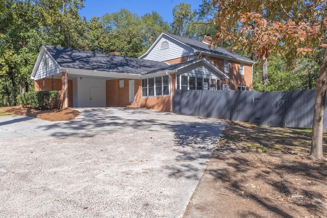 view of property exterior featuring a carport