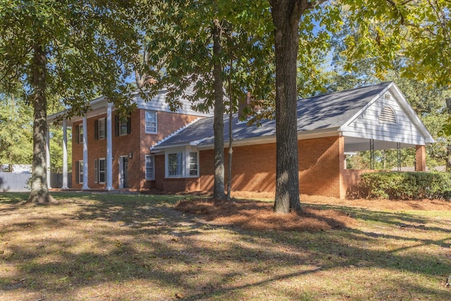 view of home's exterior featuring a lawn