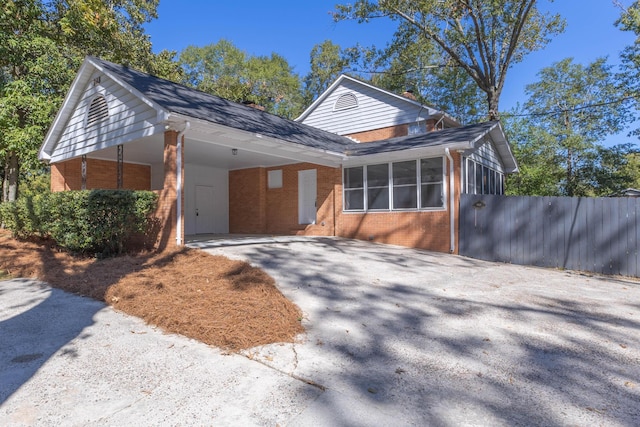 view of front facade with a carport