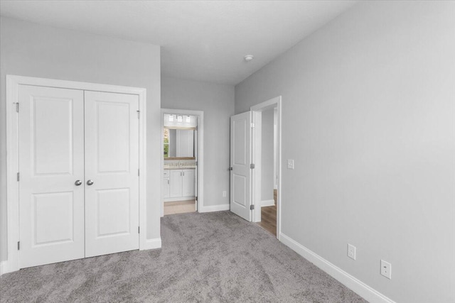 5065 Anna Way Unit Fb25, North Augusta, SC 29841 - unfurnished bedroom featuring carpet flooring, a closet, and ensuite bath
