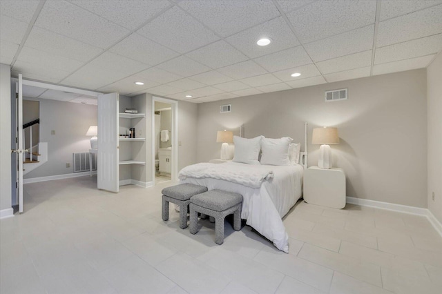 bedroom with a drop ceiling