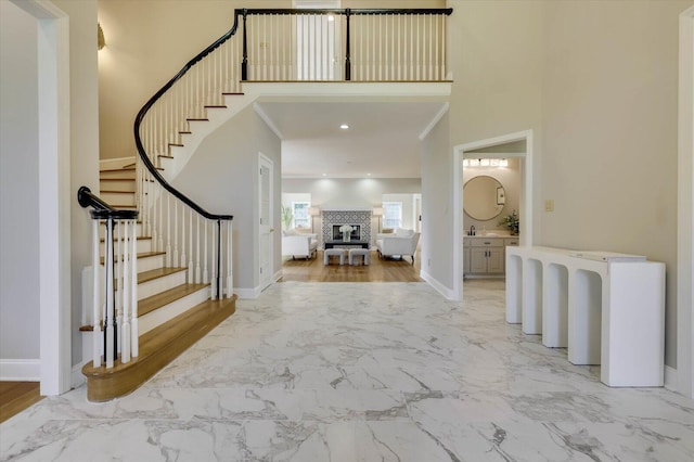 entryway with a towering ceiling