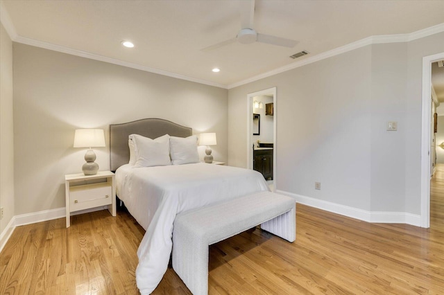 bedroom with ceiling fan, light hardwood / wood-style floors, ornamental molding, and connected bathroom