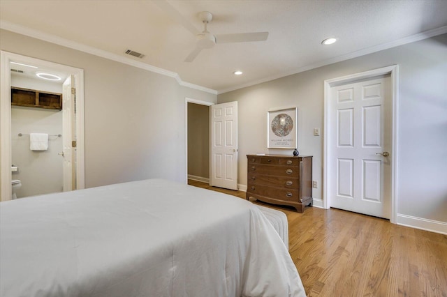 bedroom with connected bathroom, ceiling fan, light hardwood / wood-style flooring, and ornamental molding