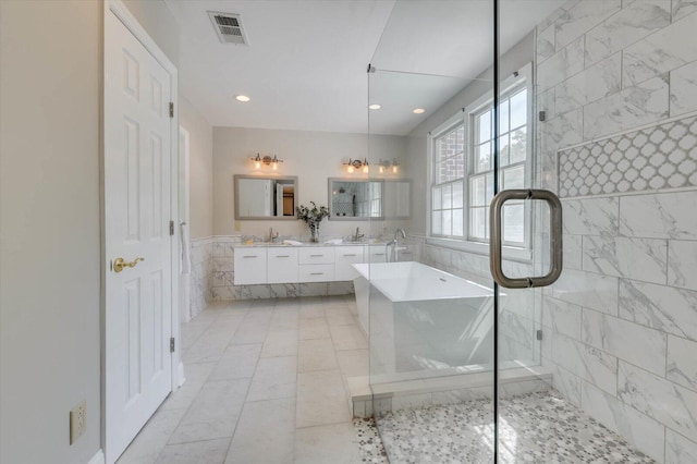 bathroom with vanity and an enclosed shower