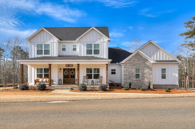 view of front of house featuring french doors and a porch