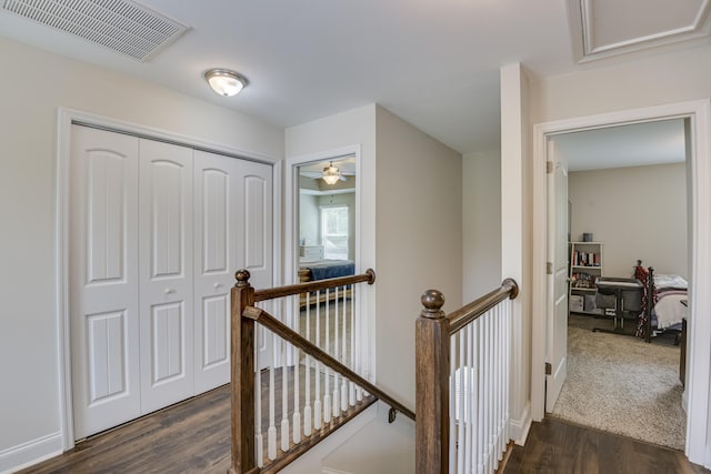 corridor with dark wood-type flooring