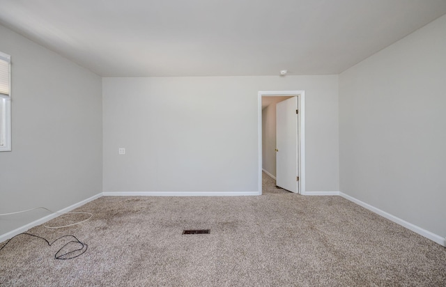 view of carpeted spare room