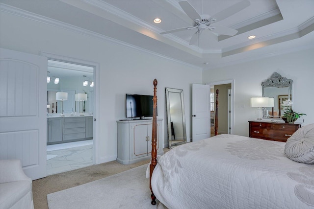 bedroom featuring a tray ceiling, recessed lighting, carpet, and ornamental molding