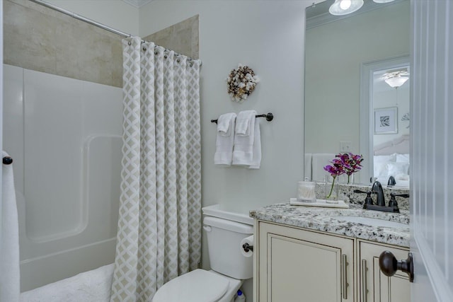 bathroom with a shower with shower curtain, toilet, and vanity