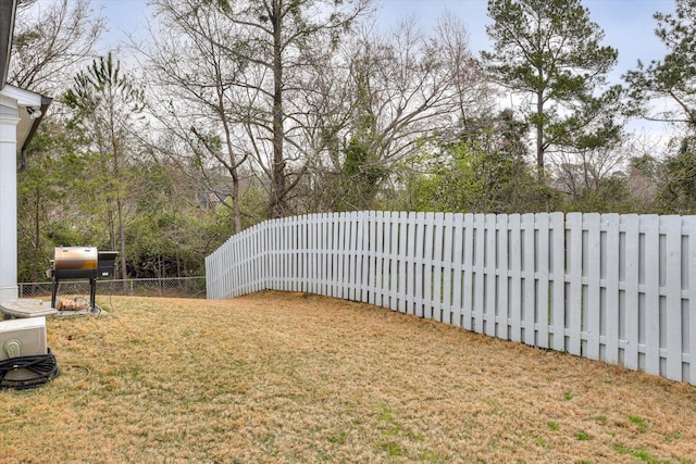 view of yard featuring a fenced backyard