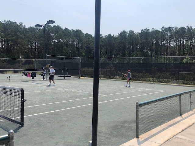 405 Sawgrass Cv, Mccormick, SC 29835 - view of tennis court featuring community basketball court
