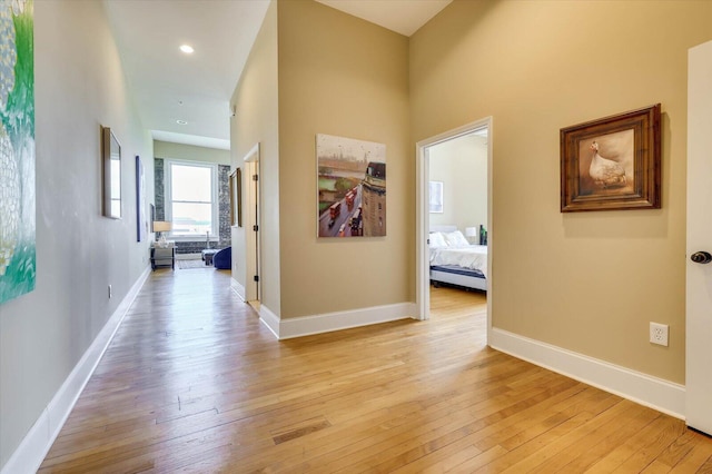 corridor featuring light wood-type flooring