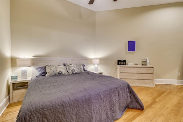 bedroom featuring ceiling fan and light hardwood / wood-style floors