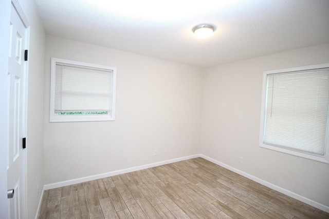 3629 Meadowgrove Dr, Augusta, GA 30906 - spare room featuring baseboards and light wood-type flooring