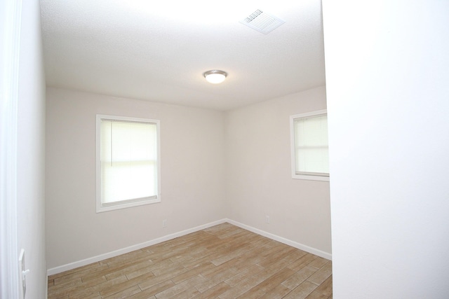3629 Meadowgrove Dr, Augusta, GA 30906 - spare room with baseboards, visible vents, and light wood-style floors