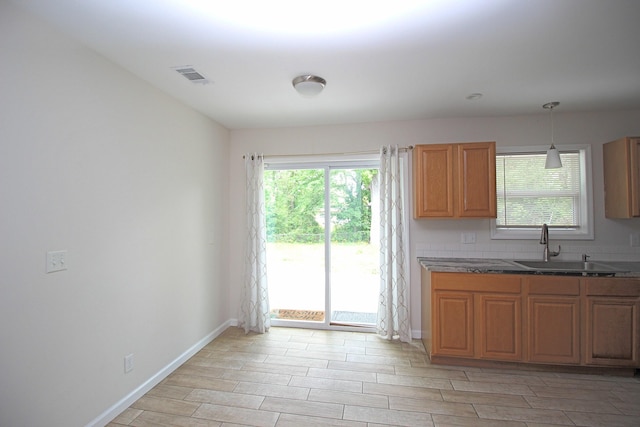 3629 Meadowgrove Dr, Augusta, GA 30906 - kitchen featuring visible vents, a sink, a wealth of natural light, and light wood-type flooring