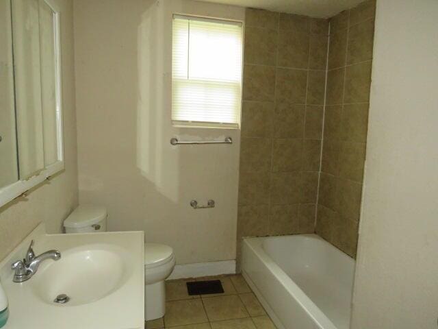 1307 Beman St, Augusta, GA 30904 - full bathroom with tile patterned flooring, vanity, and bathtub / shower combination