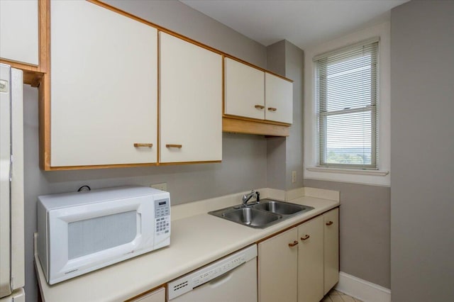 2068 Walton Way, Augusta, GA 30909 - kitchen featuring white appliances, light countertops, and white cabinets