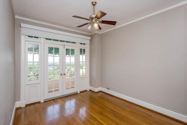 2068 Walton Way, Augusta, GA 30909 - unfurnished room featuring french doors, wood finished floors, ornamental molding, and ceiling fan