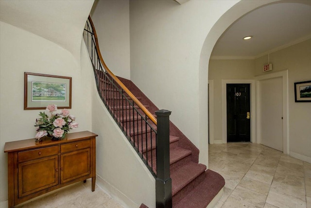 2068 Walton Way, Augusta, GA 30909 - staircase with arched walkways and recessed lighting