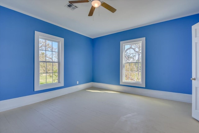 unfurnished room featuring light wood-type flooring, plenty of natural light, and ceiling fan