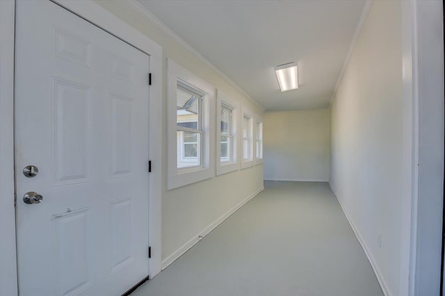 hall featuring ornamental molding