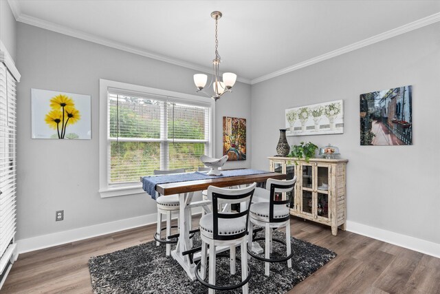 268 Anneswood Rd, Martinez, GA 30907 - dining space with ornamental molding, baseboards, wood finished floors, and a chandelier