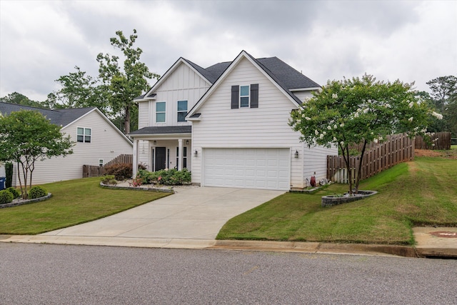 268 Anneswood Rd, Martinez, GA 30907 - traditional-style house with board and batten siding, an attached garage, driveway, and roof with shingles