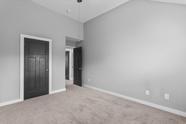 268 Anneswood Rd, Martinez, GA 30907 - unfurnished bedroom featuring carpet floors, baseboards, and lofted ceiling