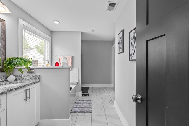 268 Anneswood Rd, Martinez, GA 30907 - bathroom featuring marble look tiles, vanity, a bath, baseboards, and recessed lighting