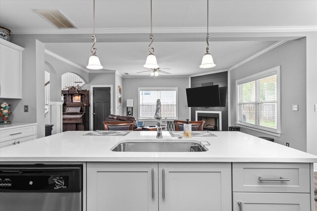 268 Anneswood Rd, Martinez, GA 30907 - kitchen featuring stainless steel dishwasher, a sink, a large fireplace, open floor plan, and ornamental molding