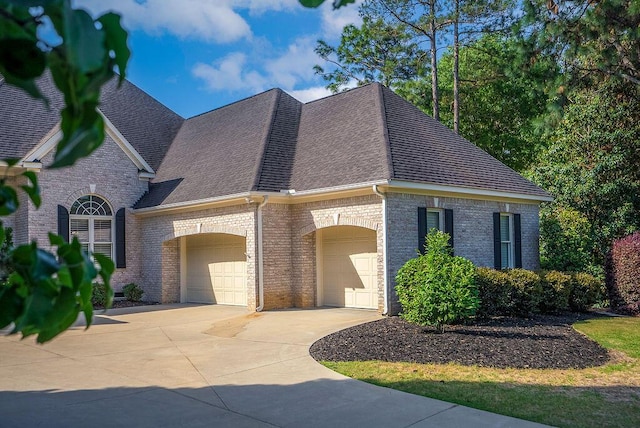 153 Longwood Green Ct, Aiken, SC 29803 - french provincial home featuring concrete driveway, brick siding, roof with shingles, and a garage