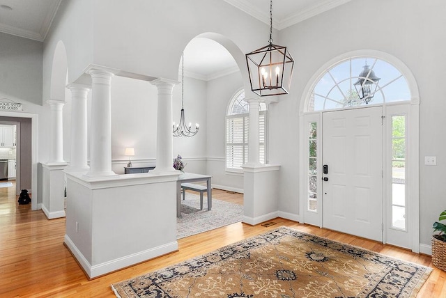 153 Longwood Green Ct, Aiken, SC 29803 - entrance foyer with light wood-style floors, crown molding, and a wealth of natural light