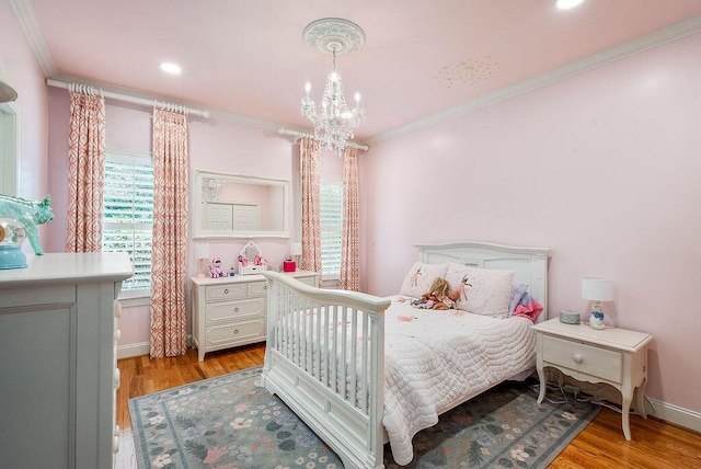 153 Longwood Green Ct, Aiken, SC 29803 - bedroom with ornamental molding, baseboards, recessed lighting, a chandelier, and light wood-style flooring